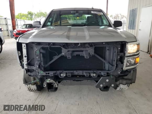 2014 Chevrolet Silverado 1500 Work Truck z VIN 1GCRCPECXEZ126329, wystawiony jako Copart lot #70720005 z przebiegiem 58 555 mil mil oraz Szkoda całkowita • Salvage title. Historia ofert i sprzedaży dostępna na DreamBid. Obrazek 5.