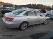 2009 Hyundai Azera GLS z VIN KMHFC46D39A360854, wystawiony jako Copart lot #79845714 z przebiegiem 58 694 mil mil oraz Czysty tytuł • Clean title. Historia ofert i sprzedaży dostępna na DreamBid. Obrazek 3.