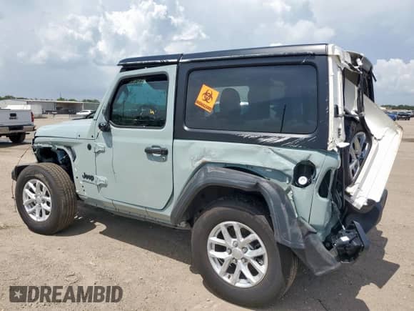 2023 Jeep Wrangler Sport with VIN 1C4HJXAG2PW650279, listed as a Copart auction lot 65038835 with 10,349 mi miles and Salvage title. Bid and sale history available at DreamBid. Image 2.