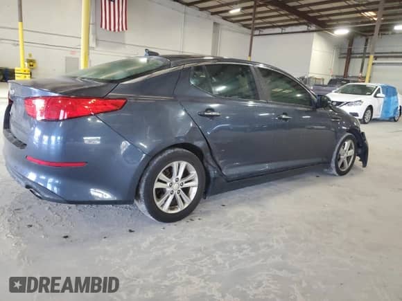 2015 Kia Optima LX с VIN 5XXGM4A75FG472546, выставлен на аукционе Copart как лот 85170525 с пробегом 233 365 миль миль и Списание • Salvage title. История ставок и продаж доступна на DreamBid. Изображение 3.