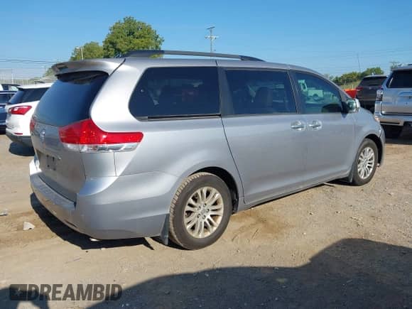 2012 Toyota Sienna XLE AAS with VIN 5TDYK3DC7CS252641, listed as a IAAI auction lot 43026895 with 220,378 mi miles and . Bid and sale history available at DreamBid. Image 4.