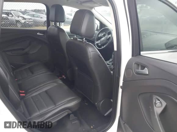 2017 Ford Escape Titanium with VIN 1FMCU9JD1HUC79837, listed as a IAAI auction lot 43172689 with 130,309 mi miles and . Bid and sale history available at DreamBid. Image 8.