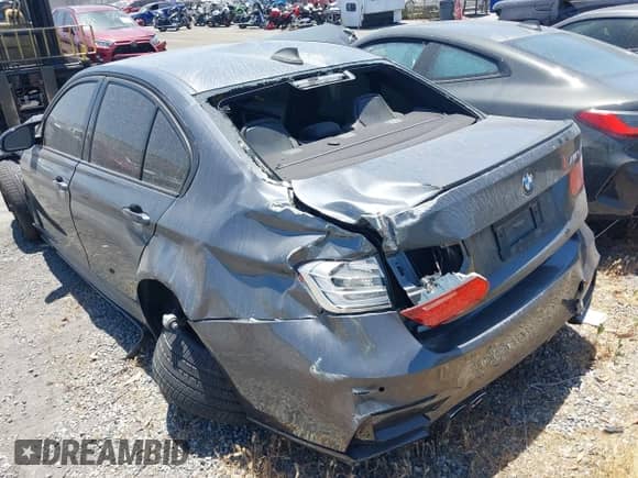 2015 BMW M3 with VIN WBS3C9C51FP806115, listed as a IAAI auction lot 42164820 with 62,774 mi miles and . Bid and sale history available at DreamBid. Image 3.