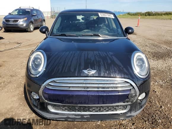 2014 MINI Hardtop with VIN WMWXM5C51ET731031, listed as a Copart auction lot 63807985 with 142,700 mi miles and Clean title. Bid and sale history available at DreamBid. Image 5.