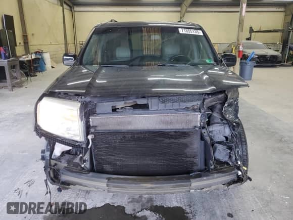 2015 Honda Pilot Touring z VIN 5FNYF3H96FB017837, wystawiony jako Copart lot #71855135 z przebiegiem 147 406 mil mil oraz Szkoda całkowita • Salvage title. Historia ofert i sprzedaży dostępna na DreamBid. Obrazek 5.