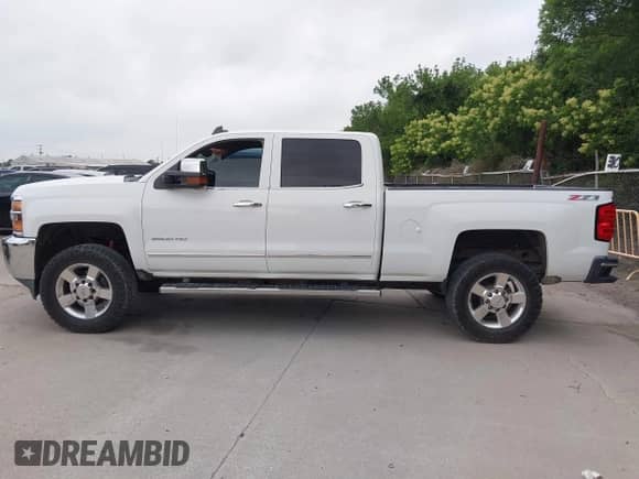 2015 Chevrolet Silverado 2500HD LTZ с VIN 1GC1KWEG7FF641157, выставлен на аукционе IAAI как лот 42294865 с пробегом 313 236 миль миль и . История ставок и продаж доступна на DreamBid. Изображение 14.