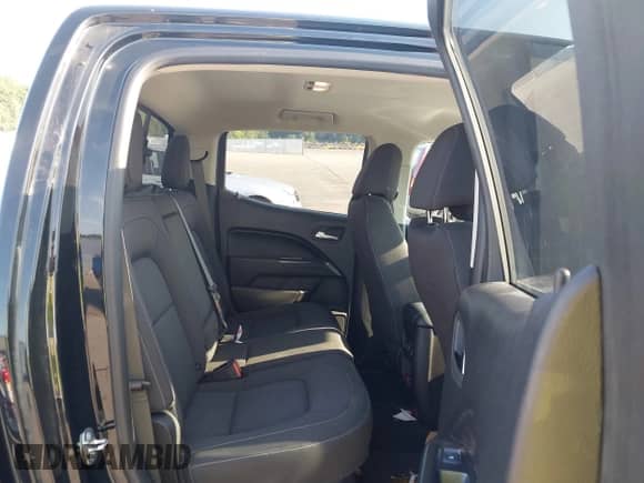 2018 Chevrolet Colorado 4WD LT z VIN 1GCGTCEN1J1324582, wystawiony jako IAAI lot #42919592 z przebiegiem 74 502 mil mil oraz . Historia ofert i sprzedaży dostępna na DreamBid. Obrazek 8.