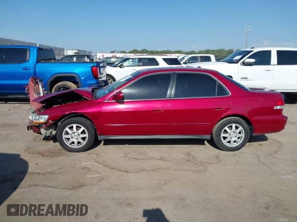 2002 Honda Accord SE z VIN 1HGCG66862A077088, wystawiony jako IAAI lot #43005506 z przebiegiem 183 261 mil mil oraz . Historia ofert i sprzedaży dostępna na DreamBid. Obrazek 14.