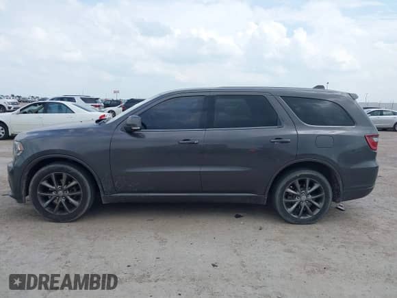 2017 Dodge Durango GT with VIN 1C4RDHDG8HC774377, listed as a IAAI auction lot 42402028 with 148,758 mi miles and . Bid and sale history available at DreamBid. Image 14.
