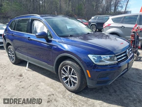2021 Volkswagen Tiguan S z VIN 3VV0B7AX1MM151318, wystawiony jako IAAI lot #41944299 z przebiegiem 39 017 mil mil oraz . Historia ofert i sprzedaży dostępna na DreamBid. Obrazek 1.