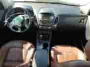 2011 Hyundai Tucson Limited with VIN KM8JU3AC7BU222304, listed as a Copart auction lot 71310104 with 118,726 mi miles and Salvage title. Bid and sale history available at DreamBid. Image 8.