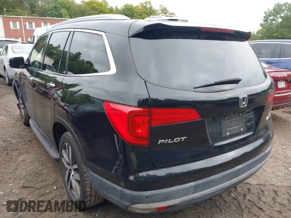 2016 Honda Pilot Touring with VIN 5FNYF6H99GB003935, listed as a IAAI auction lot 43229152 with 187,416 mi miles and . Bid and sale history available at DreamBid. Image 3.