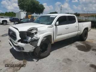 2017 Toyota Tacoma SR5 with VIN 3TMBZ5DN7HM005836, listed as a Copart auction lot 62310745 with 197,501 mi miles and Salvage title. Bid and sale history available at DreamBid. Image 1.