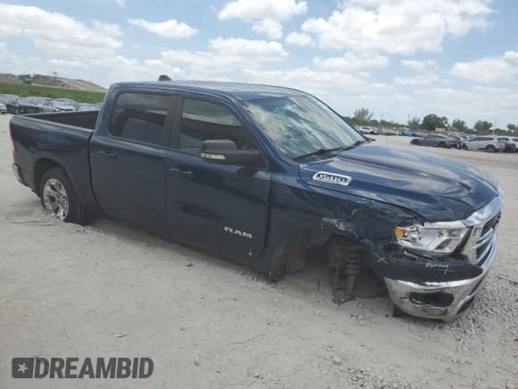 2021 Ram 1500 Big Horn z VIN 1C6RREFG5MN801831, wystawiony jako Copart lot #57651035 z przebiegiem 130 810 mil mil oraz Nie do naprawy • Non repairable. Historia ofert i sprzedaży dostępna na DreamBid. Obrazek 4.