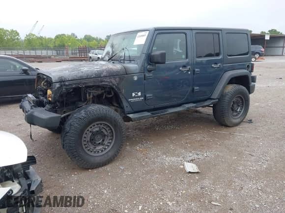 2008 Jeep Wrangler Unlimited X z VIN 1J4GA39198L509436, wystawiony jako IAAI lot #42688885 z przebiegiem Nie podano mil oraz . Historia ofert i sprzedaży dostępna na DreamBid. Obrazek 2.