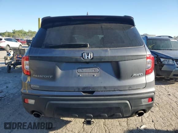 2021 Honda Passport EX-L с VIN 5FNYF8H5XMB006783, выставлен на аукционе Copart как лот 70341255 с пробегом 76 119 миль миль и Списание • Salvage title. История ставок и продаж доступна на DreamBid. Изображение 6.