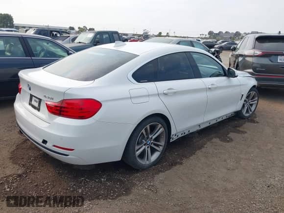 2016 BMW 4 Series 428i z VIN WBA4A9C57GG508619, wystawiony jako IAAI lot #40284412 z przebiegiem 58 504 mil mil oraz . Historia ofert i sprzedaży dostępna na DreamBid. Obrazek 4.
