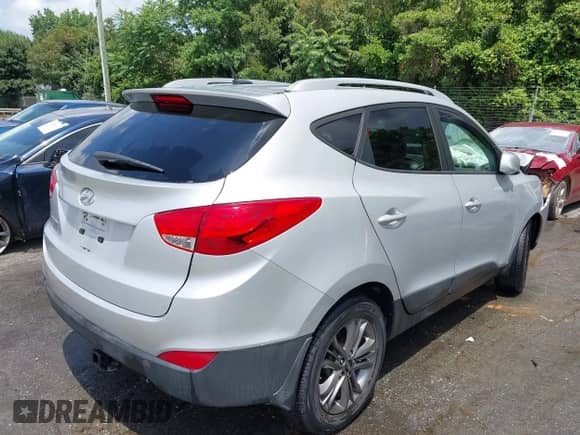 2015 Hyundai Tucson Limited z VIN KM8JU3AG7FU951976, wystawiony jako IAAI lot #42508991 z przebiegiem 128 583 mil mil oraz . Historia ofert i sprzedaży dostępna na DreamBid. Obrazek 4.