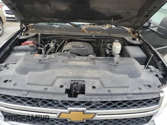 2014 Chevrolet Silverado 2500HD LT z VIN 1GC1CXCG9EF169175, wystawiony jako Copart lot #75117894 z przebiegiem 204 163 mil mil oraz Szkoda całkowita • Salvage title. Historia ofert i sprzedaży dostępna na DreamBid. Obrazek 11.