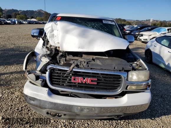 2001 GMC Sierra 1500 SLE z VIN 1GTEK19T01E336805, wystawiony jako Copart lot #82631185 z przebiegiem 223 096 mil mil oraz Szkoda całkowita • Salvage title. Historia ofert i sprzedaży dostępna na DreamBid. Obrazek 5.