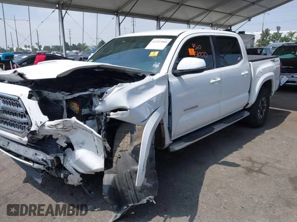 2017 Toyota Tacoma SR5 with VIN 3TMAZ5CN6HM030241, listed as a IAAI auction lot 42357004 with 120,779 mi miles and . Bid and sale history available at DreamBid. Image 2.