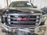 2017 GMC Sierra 1500 SLT with VIN 3GTU2NEC4HG164404, listed as a IAAI auction lot 43001474 with 103,649 mi miles and . Bid and sale history available at DreamBid. Image 12.