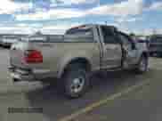 2003 Ford F-150 XLT with VIN 1FTRW08L93KB25558, listed as a Copart auction lot 81910345 with 169,885 mi miles and Salvage title. Bid and sale history available at DreamBid. Image 3.