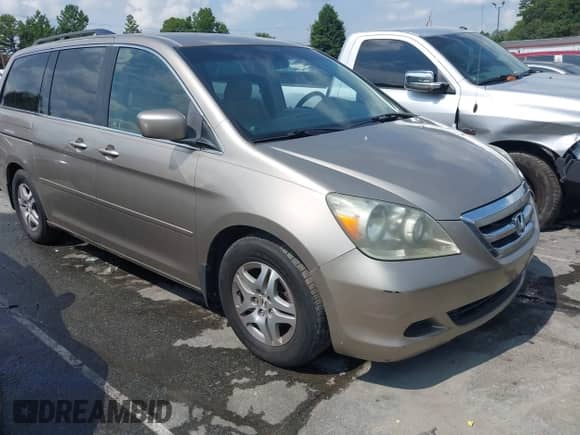2005 Honda Odyssey EX z VIN 5FNRL38465B409863, wystawiony jako IAAI lot #43009481 z przebiegiem 255 902 mil mil oraz . Historia ofert i sprzedaży dostępna na DreamBid. Obrazek 1.