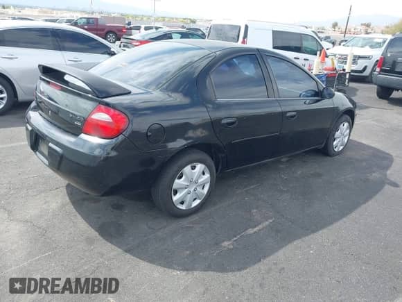 2004 Dodge Neon SXT with VIN 1B3ES56C44D527117, listed as a IAAI auction lot 42077644 with 162,017 mi miles and . Bid and sale history available at DreamBid. Image 4.