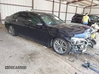 2019 BMW 7 Series 750i with VIN WBA7F0C55KGM24477, listed as a IAAI auction lot 42883182 with 76,932 mi miles and . Bid and sale history available at DreamBid. Image 1.