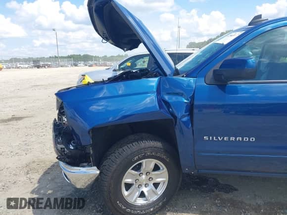 2015 Chevrolet Silverado 1500 LT z VIN 1GCVKREH7FZ251184, wystawiony jako IAAI lot #42564447 z przebiegiem Nie podano mil oraz . Historia ofert i sprzedaży dostępna na DreamBid. Obrazek 17.