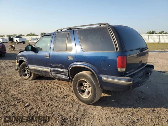 1999 Chevrolet Blazer LS z VIN 1GNCS13W9X2194269, wystawiony jako Copart lot #75468004 z przebiegiem 154 501 mil mil oraz Szkoda całkowita • Salvage title. Historia ofert i sprzedaży dostępna na DreamBid. Obrazek 2.
