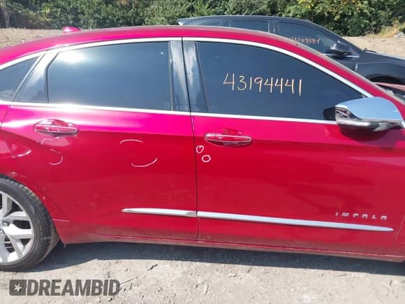 2014 Chevrolet Impala LTZ with VIN 2G1155S39E9235562, listed as a IAAI auction lot 43194441 with 189,669 mi miles and . Bid and sale history available at DreamBid. Image 14.