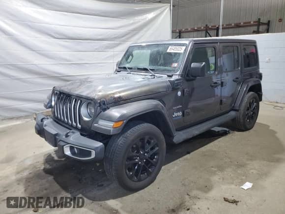 2021 Jeep Wrangler Unlimited Sahara with VIN 1C4JJXP61MW720916, listed as a Copart auction lot 66485005 with Not provided miles and Salvage title. Bid and sale history available at DreamBid. Image 1.