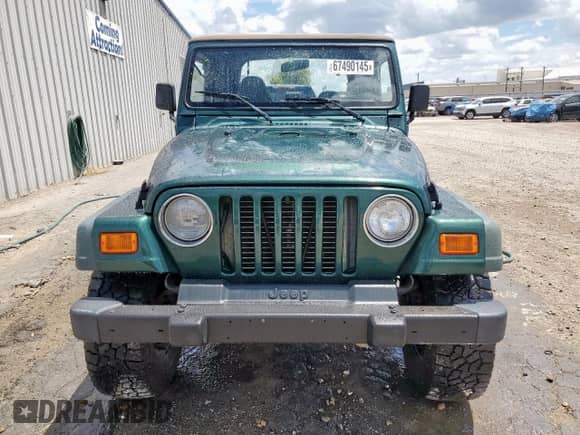 2000 Jeep Wrangler SE with VIN 1J4FA29P2YP800721, listed as a Copart auction lot 67490145 with 128,182 mi miles and Clean title. Bid and sale history available at DreamBid. Image 5.