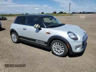 2015 MINI Hardtop with VIN WMWXM5C51F3A04184, listed as a Copart auction lot 63742035 with 150,029 mi miles and Salvage title. Bid and sale history available at DreamBid. Image 4.