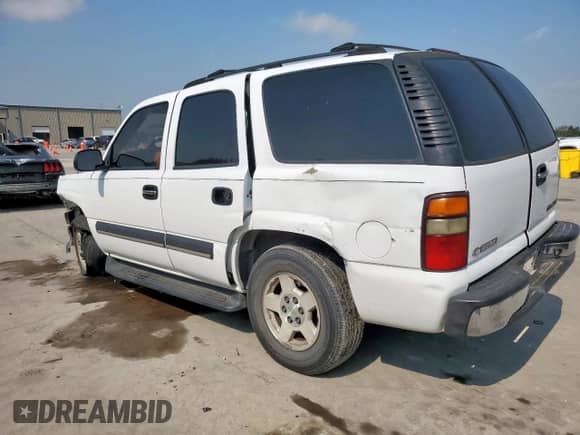 2004 Chevrolet Tahoe LS z VIN 1GNEC13V64R174187, wystawiony jako Copart lot #81598935 z przebiegiem Nie podano mil oraz Szkoda całkowita • Salvage title. Historia ofert i sprzedaży dostępna na DreamBid. Obrazek 2.