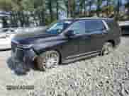 2022 Cadillac Escalade Premium Luxury с VIN 1GYS4BKL9NR143137, выставлен на аукционе Copart как лот 55145505 с пробегом 56 001 миль миль и Списание • Salvage title. История ставок и продаж доступна на DreamBid. Изображение 1.