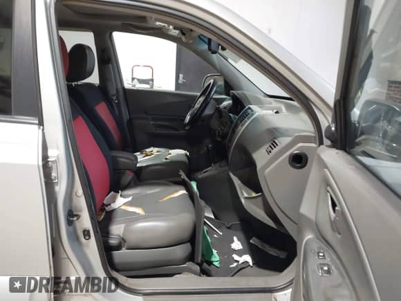 2007 Hyundai Tucson SE z VIN KM8JN12D47U485785, wystawiony jako IAAI lot #43306100 z przebiegiem 179 960 mil mil oraz . Historia ofert i sprzedaży dostępna na DreamBid. Obrazek 5.