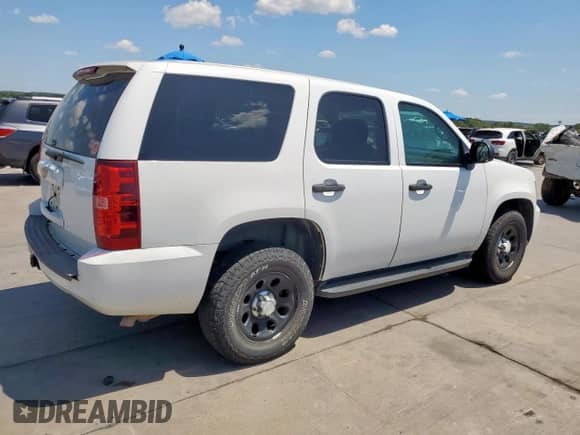 2013 Chevrolet Tahoe Commercial z VIN 1GNSK2E09DR349030, wystawiony jako Copart lot #69140325 z przebiegiem 163 621 mil mil oraz Czysty tytuł • Clean title. Historia ofert i sprzedaży dostępna na DreamBid. Obrazek 3.