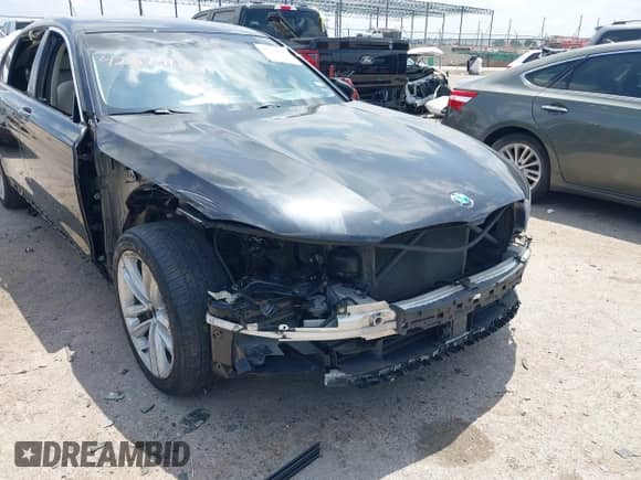 2018 BMW 7 Series 750i with VIN WBA7F0C57JGM23748, listed as a IAAI auction lot 42374137 with 111,120 mi miles and . Bid and sale history available at DreamBid. Image 6.