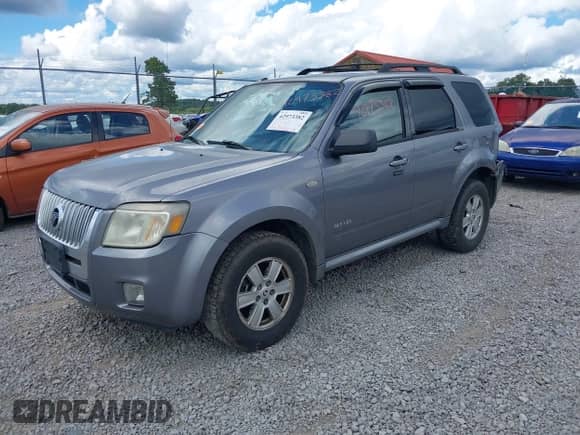 2008 Mercury Mariner with VIN 4M2CU91178KJ14388, listed as a IAAI auction lot 42973382 with 219,954 mi miles and . Bid and sale history available at DreamBid. Image 2.