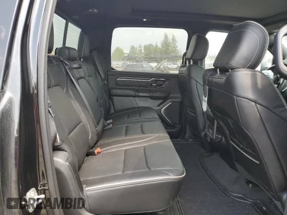 2023 Ram 1500 Limited с VIN 1C6SRFHT9PN700992, выставлен на аукционе Copart как лот 68579835 с пробегом 18 133 миль миль и Списание • Salvage title. История ставок и продаж доступна на DreamBid. Изображение 10.