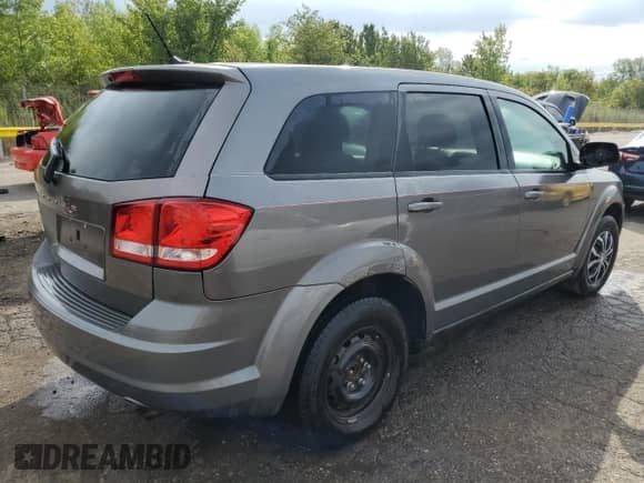2012 Dodge Journey American Value с VIN 3C4PDCABXCT146160, выставлен на аукционе Copart как лот 70640965 с пробегом 88 931 миль миль и Чистый • Clean title. История ставок и продаж доступна на DreamBid. Изображение 3.