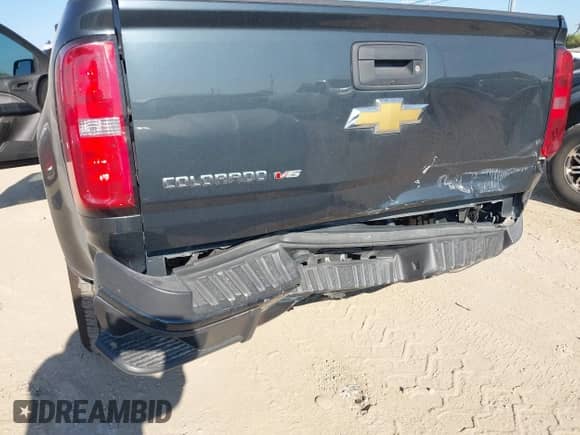 2018 Chevrolet Colorado 2WD Work Truck with VIN 1GCHSBEN7J1250277, listed as a IAAI auction lot 43496456 with 99,091 mi miles and . Bid and sale history available at DreamBid. Image 6.