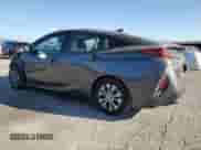 2021 Toyota Prius XLE with VIN JTDKAMFP7M3176372, listed as a Copart auction lot 85538665 with 60,006 mi miles and Salvage title. Bid and sale history available at DreamBid. Image 2.