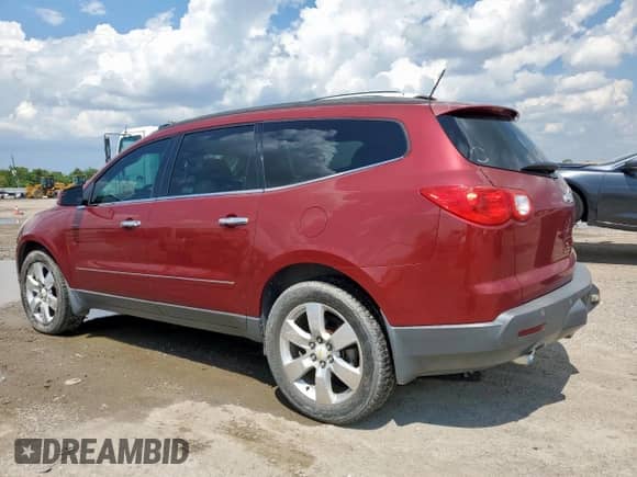 2011 Chevrolet Traverse LTZ с VIN 1GNKRLED0BJ186171, выставлен на аукционе Copart как лот 71225325 с пробегом 206 699 миль миль и Списание • Salvage title. История ставок и продаж доступна на DreamBid. Изображение 2.