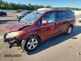 2012 Toyota Sienna LE AAS with VIN 5TDKK3DC9CS279054, listed as a Copart auction lot 69786185 with 182,625 mi miles and Salvage title. Bid and sale history available at DreamBid. Image 1.