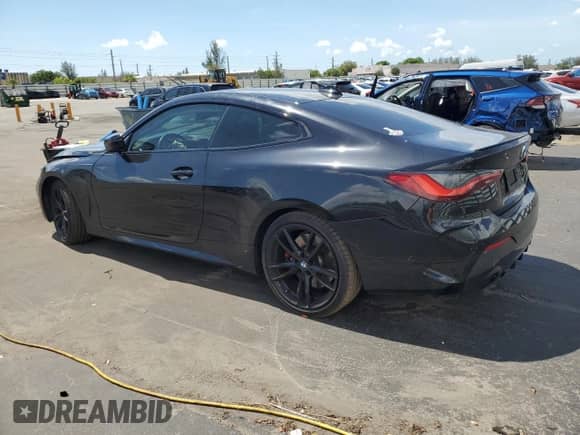 2022 BMW 4 Series 430i with VIN WBA53AP02NCJ83946, listed as a Copart auction lot 61433115 with 56,572 mi miles and Non repairable. Bid and sale history available at DreamBid. Image 2.