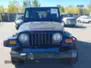 2005 Jeep Wrangler X z VIN 1J4FA39S75P306974, wystawiony jako IAAI lot #43506239 z przebiegiem Nie podano mil oraz . Historia ofert i sprzedaży dostępna na DreamBid. Obrazek 11.